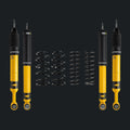 Yellow offroad shock absorbers and black coil springs suspension kit for vehicles in Lebanon.