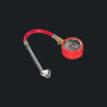 Red tire pressure gauge with analog dial for offroad vehicles in Lebanon